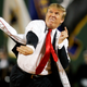 Donald Trump throws out the first pitch at a Red Sox game in 2006.